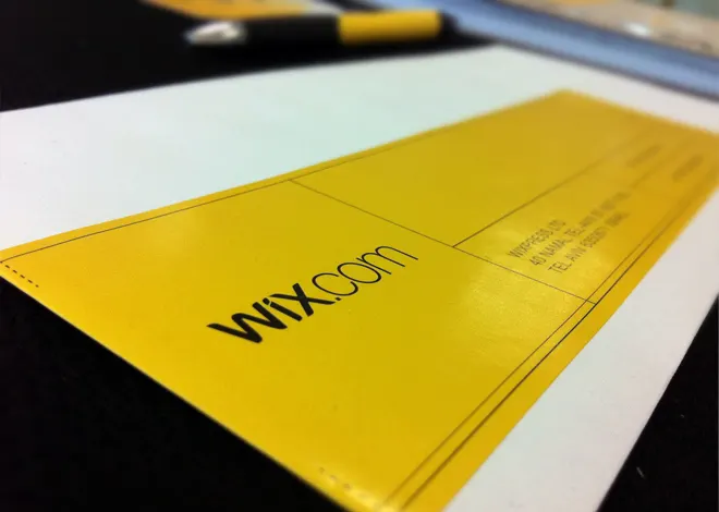 Eye-level view of a laptop screen showing a Wix website editor interface